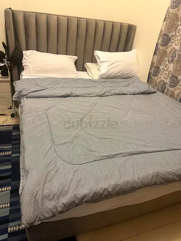 Queen bed with mattress for sale