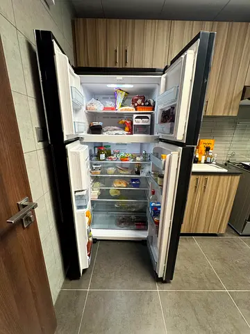 Hitachi Spacious Double-Door Refrigerator with Freezer — Less than 1 year old excellent condition