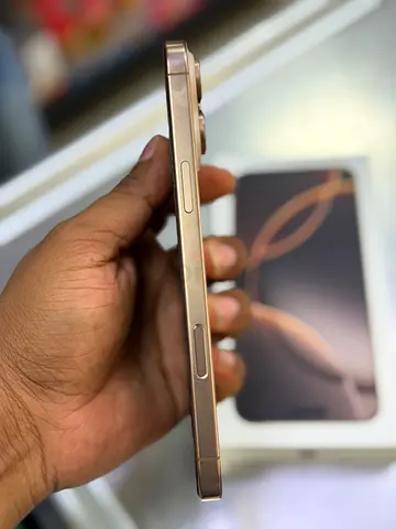 iPhone 16 Pro Max in Desert Titanium. 
Display: 6.9-inch Super Retina XDR display with Dynamic Islan