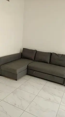 Grey L-shaped Corner Sofa with Storage - Good Condition