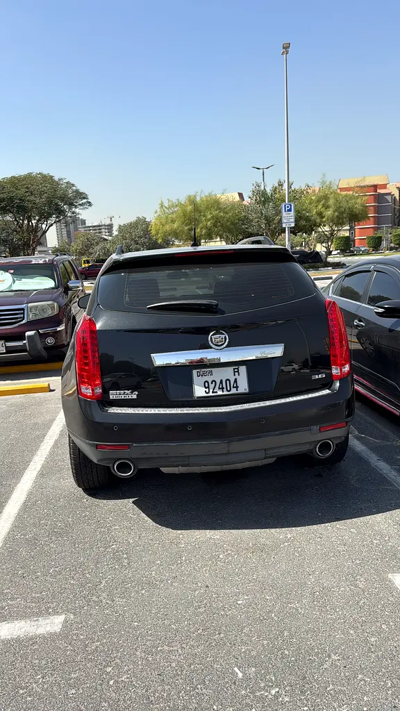 Cadillac SRX 2014 — photo 1 of 13
