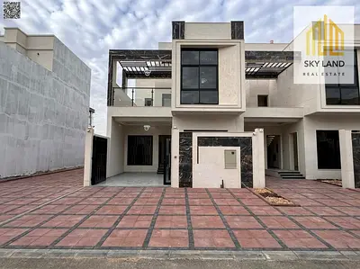 Two-story villa with a rooftop terrace, located on the main street, ready for immediate occupancy, in one of Ajman's most prestigious neighborhoods.