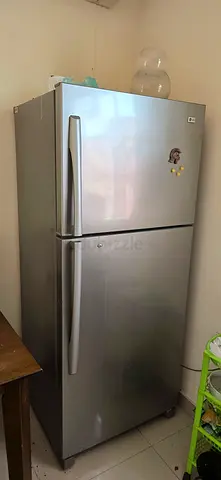 Used Silver Double Door Refrigerator - Spacious Top Freezer