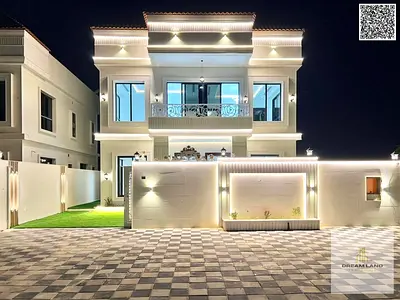 Direct from the owner, including all ownership fees: a villa in one of Ajman's most luxurious villas, built and finished to a super deluxe standard, w