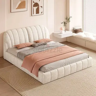 Modern upholstered platform bed with curved headboard -