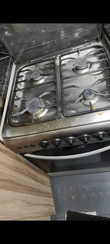 Stainless Steel 4-Burner Gas Stove with Oven - Used, Working at throw away price