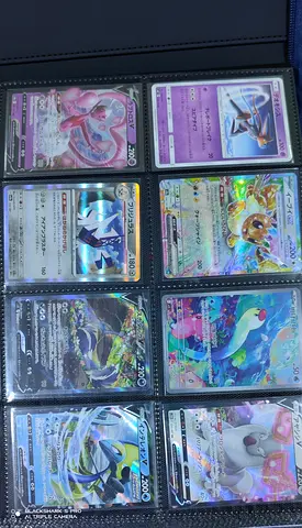 Collection of Holographic Pokémon Cards in Binder - Various Rare/Promo Cards