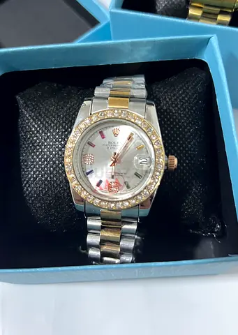 Two-tone womens wristwatch with crystal bezel New brand
