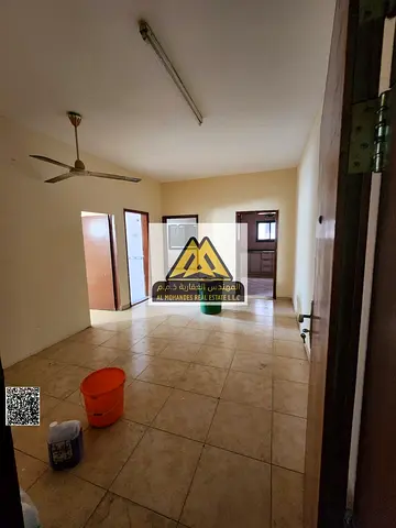 One-bedroom apartment with living room in Al Nakheel 1, Ajman, large space, balcony, one bathroom, no AC, near the Corniche, AED 24,000 in 6 installme