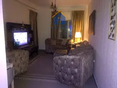 For sale, a two-bedroom apartment in Al Taawun