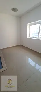 A studio apartment for annual rent in the Al Taawun area of ​​Sharjah, boasting a prime location