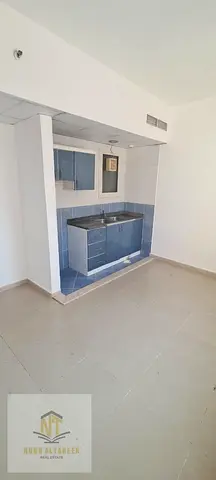 A studio apartment for annual rent in the Al Taawun area of ​​Sharjah, boasting a prime location close to all essential services and amenities such as