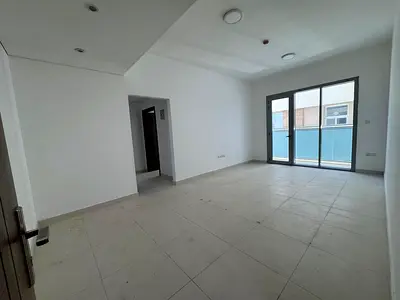 One bedroom and living room for rent in Al-Jada, Muwaileh. Includes a master bedroom, built-in wardrobes, central air conditioning, open view, and a p