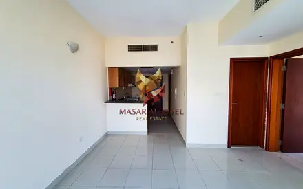 1BR Apartment | Downtown City View | Balcony | Cricket Tower Sports City