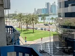 Two bedrooms and a living room for rent in Al Majaz 3, with balconies and central gas, in a prime lo