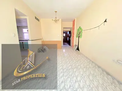 NO DEPOSIT SPECIOUS NICE ONE BHK CENTRALISED AC AND GAS WITH BALCONY FAMILY BUILDING JUST 30K AL MAHATAH