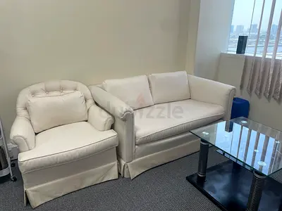White 2-Seater Sofa and Matching Armchair — Good Condition