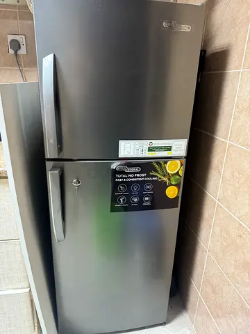 Used Silver Double-Door Refrigerator - Good Working Condition