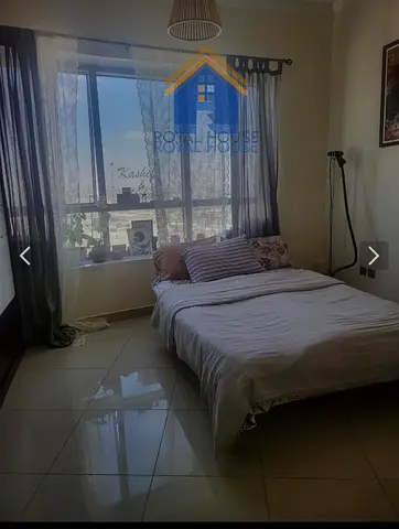 Two-bedroom apartment with a living room, lowest price in Sharjah