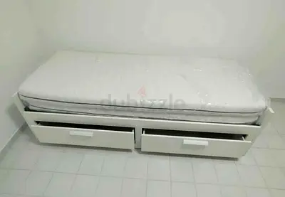 IKEA brimness Day bed with 2 storage drawers underneath and with 2 IKEA mattresses