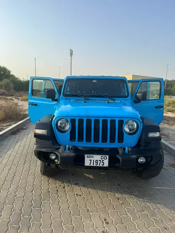 Blue Jeep Wrangler Unlimited - 4x4 Offroad SUV (UAE Plates)
