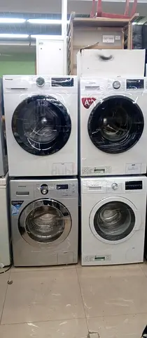Four Front-Load Washing Machines — Assorted Models, Good Working Condition