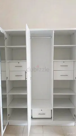 White 3-Door Wardrobe with Drawers and Shelves - Good as new Condition.