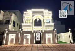 Villa for sale in Ajman, next to the Chinese market. Classic style, stone facade, personal finishing