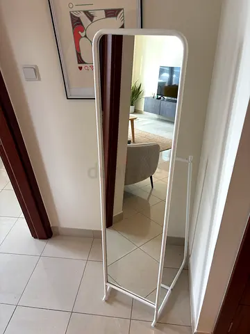 Full-length freestanding white framed mirror — good condition