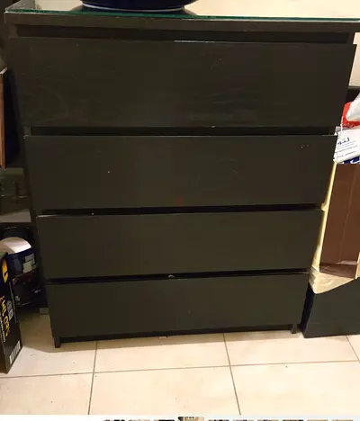 IKEA black-brown 4-drawer dresser (solid, good condition)