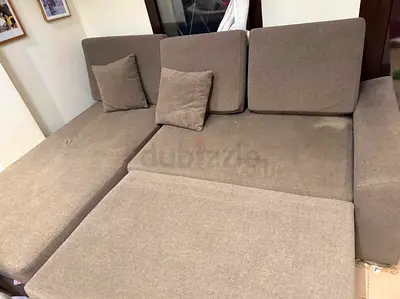Sofa cum bed with side storage