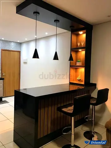 Modern Black Kitchen Island with Bar Counters and Pendant Lighting