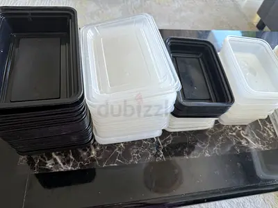 Bulk black and white plastic food trays - multiple pieces