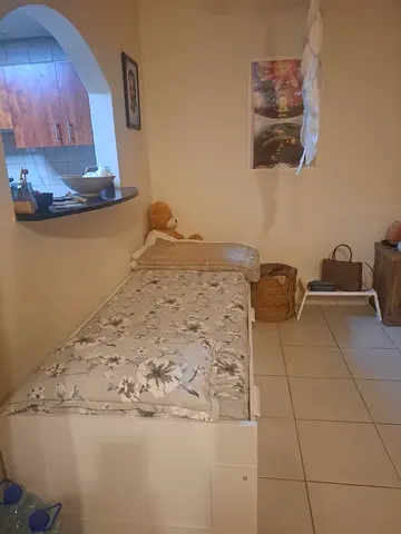 White wooden bed extendable to double bed with mattress - good condition