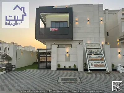 Modern villa for sale in Al Amerah Garden, ground floor, first floor, and wall with a swimming pool, strategic location and close to all services, eas