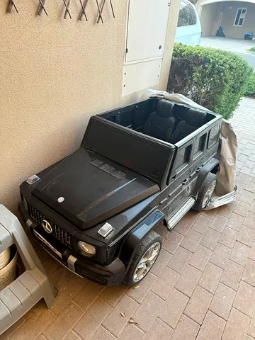 Kids ride-on Mercedes G-Class electric car - 4-seater, black