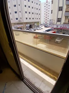 For rent in Al Nuaimiya 1, opposite Afghan Kebab 2BR master + living room, 2 bathrooms, balcony Cent