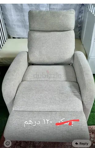 Light grey fabric reclining armchair - good condition
