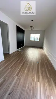 For annual rent in Ajman Two bedrooms, a living room, two bathrooms, and a rooftop terrace Second te