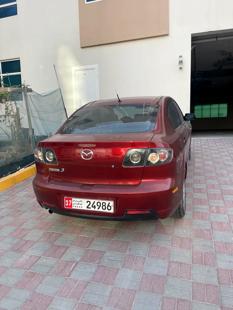 Mazda 3 2009 — photo 1 of 3