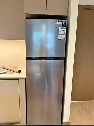 Silver top-freezer refrigerator - good condition