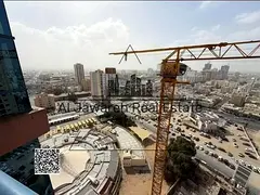 Unfurnished studio apartment for sale in Al Nuaimiya Towers, Ajman.