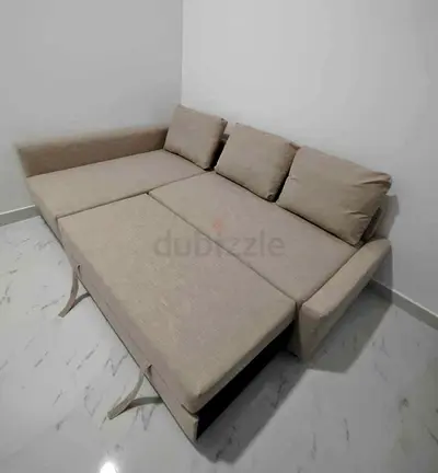 Ikea L Shape Sofa cum bed with big storage in L