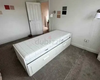 l brimness  Day bed with 2 storage drawers underneath and with 2 IKEA mattresses