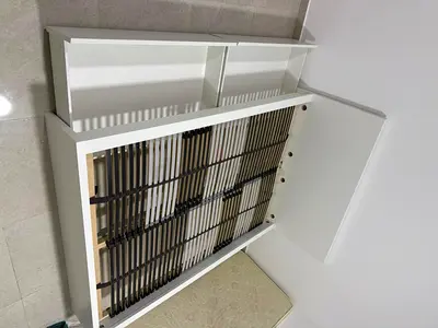 Ikea White single bed frame with storage shelves