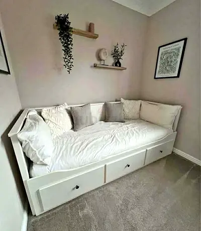 IKEA Hamnes Day bed with 3 storage drawers underneath and with 2 IKEA mattresses