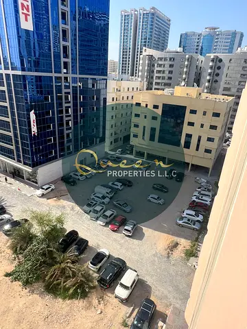 One bedroom and living room for annual rent at 34,000 AED in a prime location in Al Nuaimiya 3, next to Dubai Islamic Bank on Khalifa Street, minutes