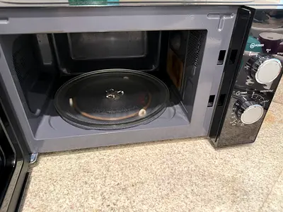 Compact Solo Microwave Oven with Dial Controls - Good Working Condition