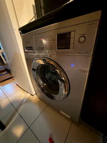 Front-load washing machine - working condition, stainless silver
