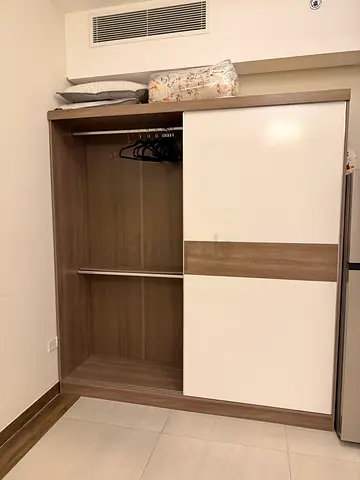 Two-door Sliding Wardrobe / Armoire in Wood Finish (Good Condition)